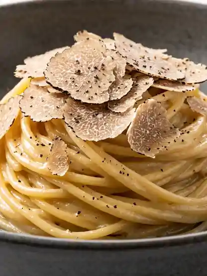 Spaghetti Artigianali al Burro Fuso e Tartufo Nero Scorzone